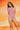 Pink short sleeve square neck bodysuit from Online Boutique Australia, fitted t-shirt style.