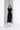 A midi dress with a crew neck design, crafted from supima cotton. Soft and stretchy, perfect for comfortable everyday wear and versatile styling for various occasions