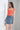Neon orange short sleeve t-shirt for women, a vibrant and stylish summer fashion choice.